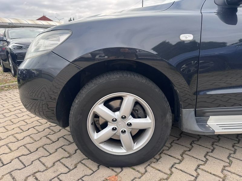 Hyundai Santa Fe (2007) 4X4 2,2CRDI 114KW 7 MÍST AUTOM - fotka 13 z 50