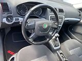 Škoda Octavia (2011) 1.2 TSi, Ambition, DSG, TZ - náhled 12