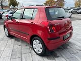 Suzuki Swift (2009) 1,3 i 66 Kw 4x4 - náhled 7