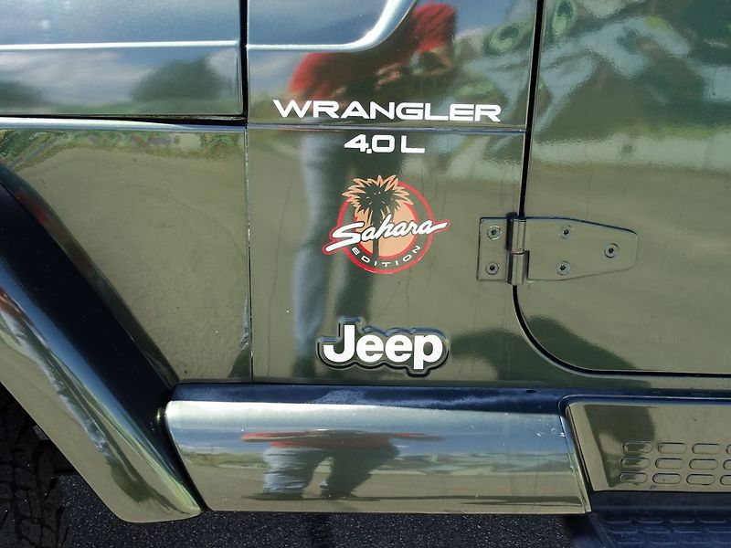 Jeep Wrangler 4.0i SAHARA Serviska - fotka 28 z 37