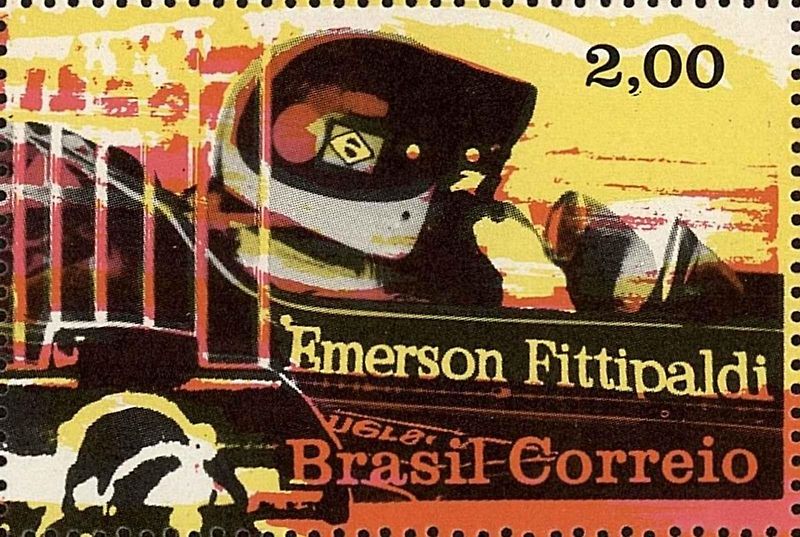 Emerson Fittipaldi v kokpitu Lotusu 72 s šéfem týmu Coline Chapmanem.