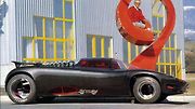 Osmos (1989). Přehlédněte onen pekelný design i dvanáctiválec od Jaguaru, na konceptu Osmos jsou nejúžasnější jeho takzvaná orbitální kola. Postrádají klasicky střed, jsou na vnitřní straně uchycena letmo a využívají obřích ložisek. Poháněna jsou řetězem.