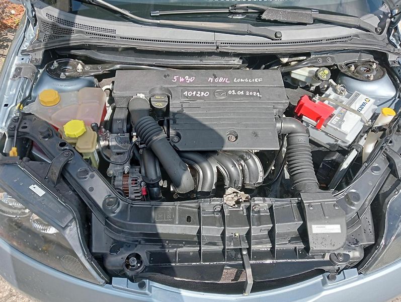 Mazda 2 (2006) 1.4i, AUTOMAT - fotka 20 z 24
