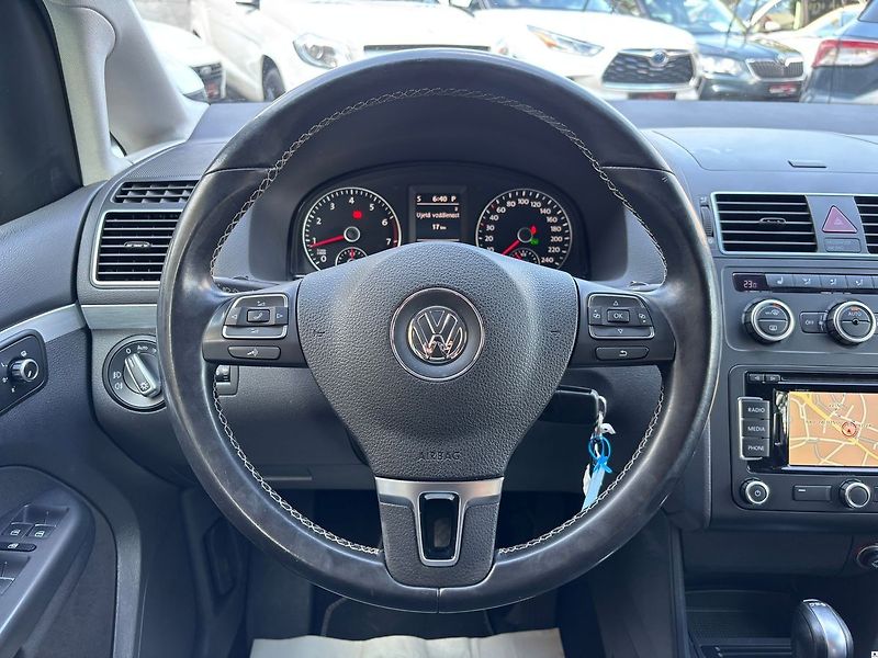 Volkswagen Touran 1.4TSI-103KW.DSG.7MÍST.ZÁRUKA - fotka 29 z 51