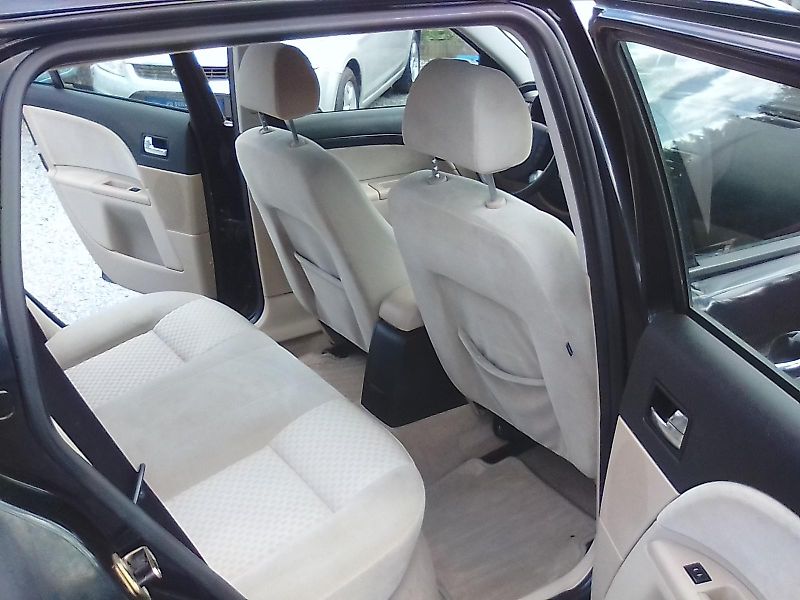 Ford Mondeo (2007) 1.8i 16V Ghia , závěs - fotka 25 z 35