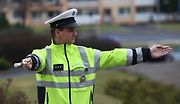 Ilustrační foto. Křižovatka řízená policistou.