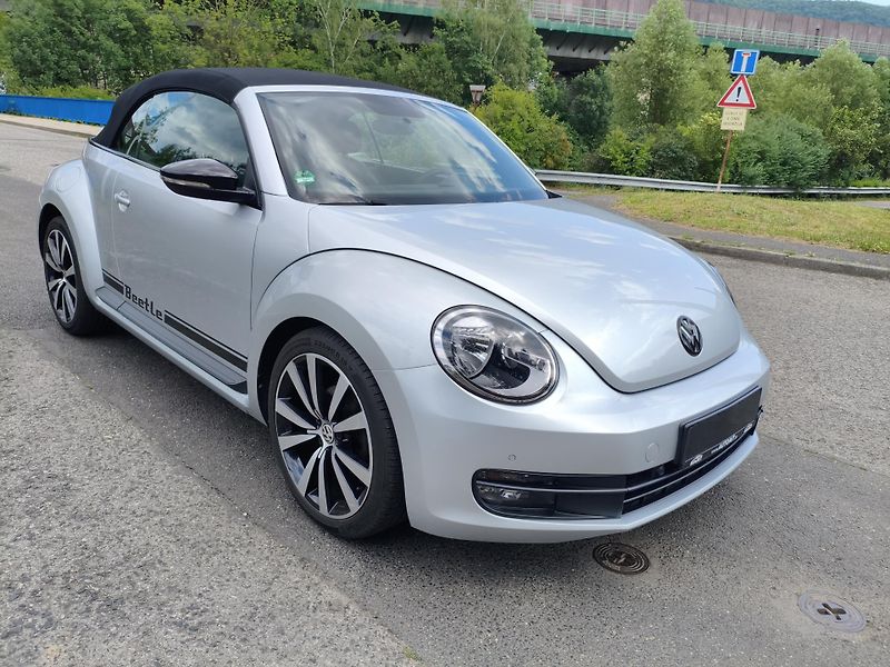 Volkswagen Beetle (2013) 1,2 TSI Cabrio Sport - fotka 4 z 35