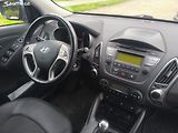 Hyundai ix35 2.0D4X4,70KM,MAX VÝBAVA,KRÁSNÝ - náhled 14
