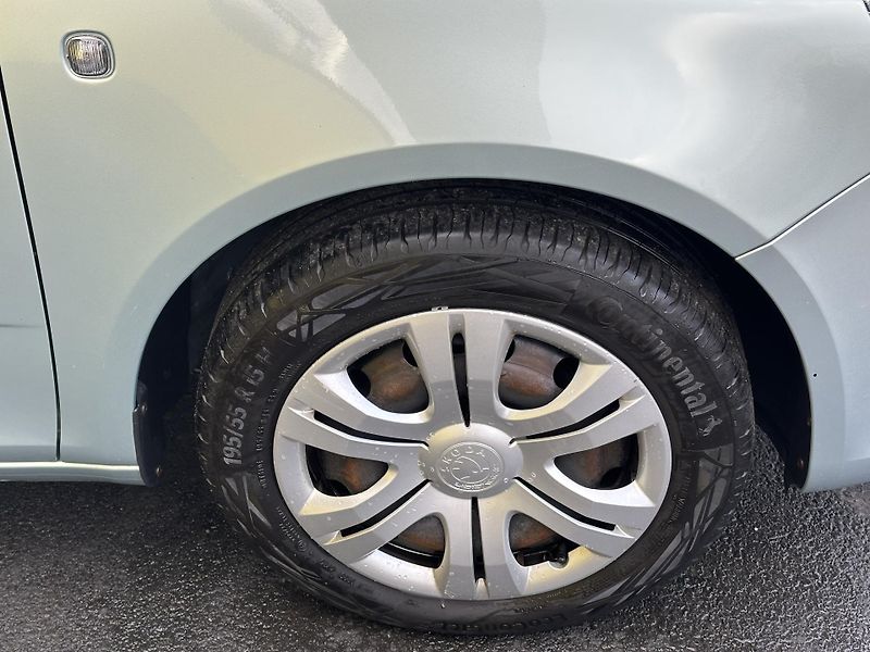 Škoda Fabia (2011) KOMBI 1.2TSI/63kW *KLIMA/TZ*  - fotka 27 z 28