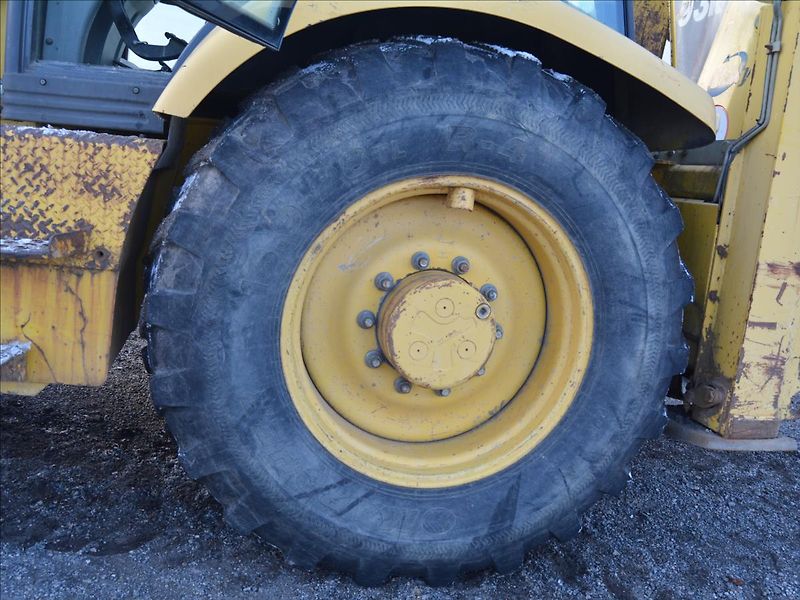 Komatsu WB 93R - fotka 8 z 14