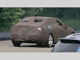 Maskovaný prototyp Audi A7.