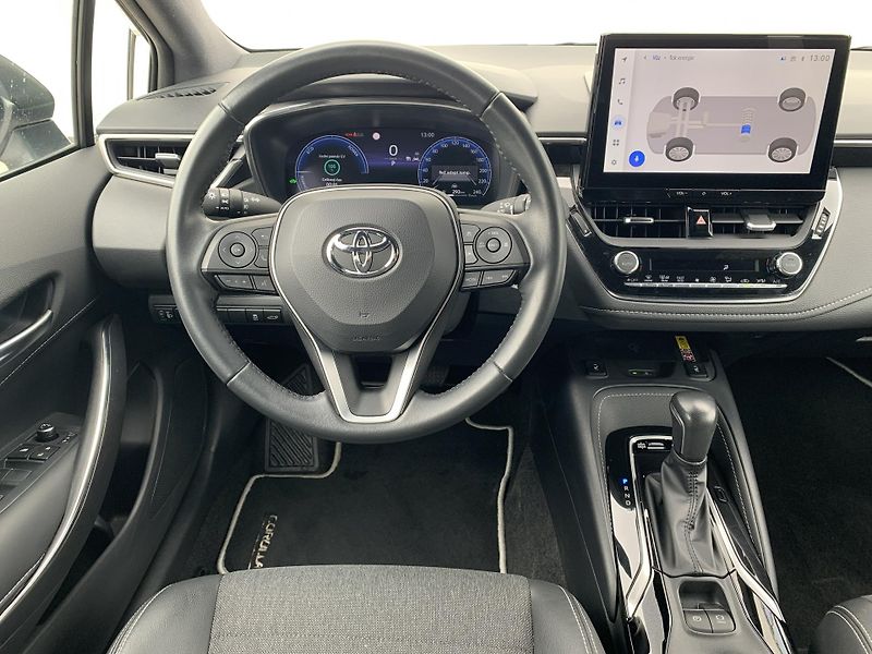 Toyota Corolla TS STYLE 1.8 HEV 103kW e-CVT - fotka 19 z 29