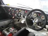 Pohled do kokpitu vozu Porsche 962C.