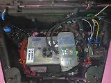 Motorový prostor s elektronikou, chlazením a výkonovými moduly.