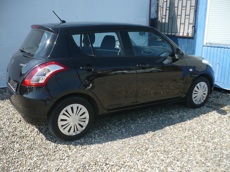 Suzuki Swift 1.2i 66Kw Klima - fotka 6 z 23