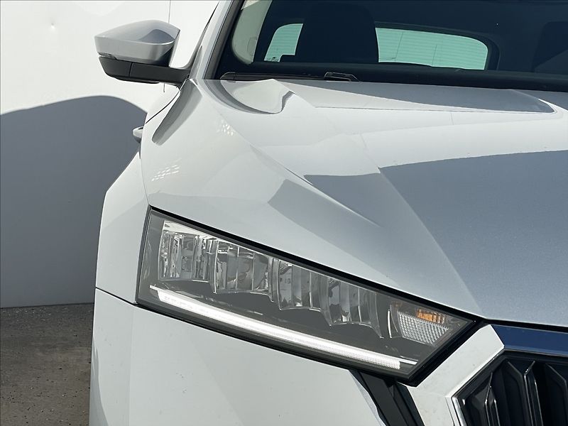 Škoda Octavia 2,0 TDI Combi Ambition Plus - fotka 21 z 24