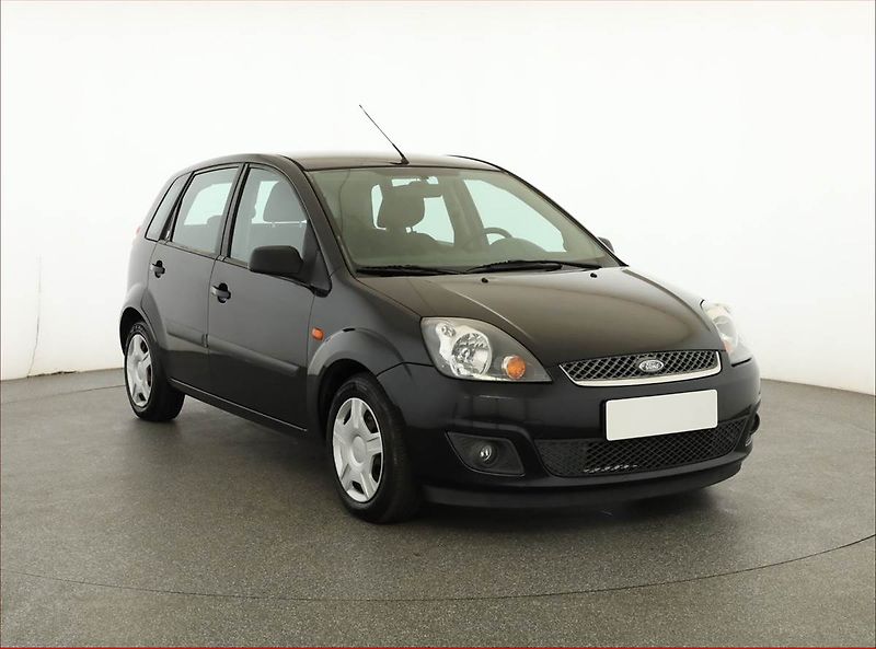 Ford Fiesta (2006) Ghia 1.25, plně pojízdný - fotka 1 z 12