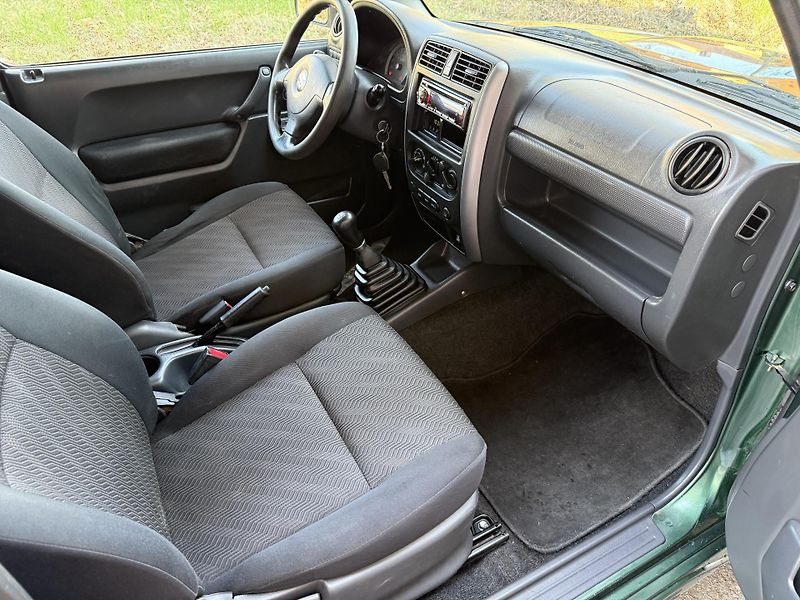 Suzuki Jimny 1,3 4x4 Servisní kniha - fotka 12 z 21