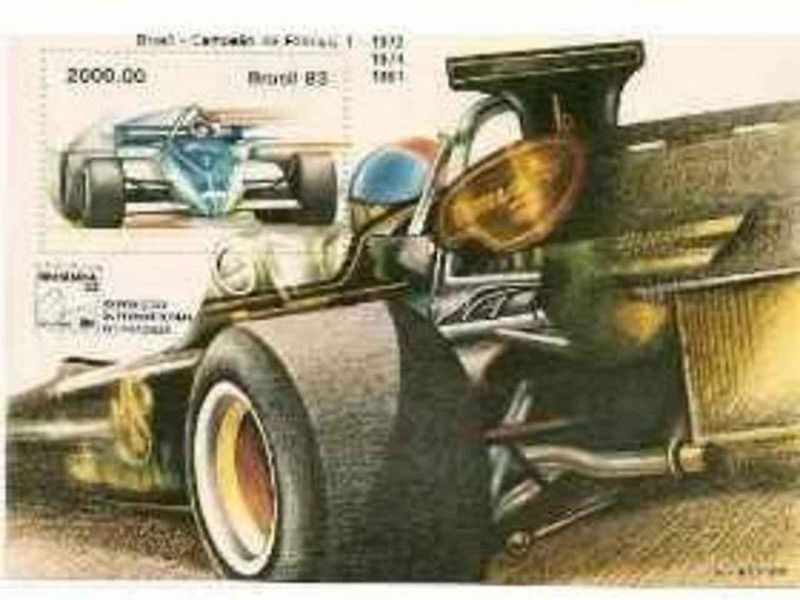 Emerson Fittipaldi v kokpitu Lotusu 72 s šéfem týmu Coline Chapmanem.