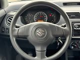 Suzuki Swift (2009) 1,3 i 66 Kw 4x4 - náhled 16