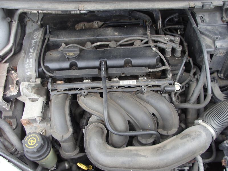 Ford Focus 1.6i, 74 kW, klimatizace - fotka 19 z 24
