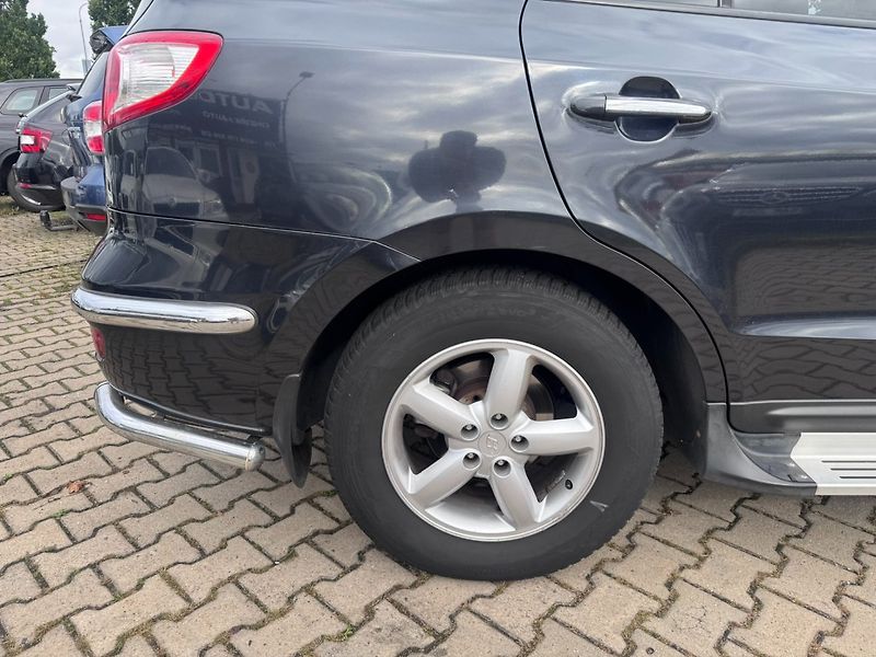 Hyundai Santa Fe (2007) 4X4 2,2CRDI 114KW 7 MÍST AUTOM - fotka 15 z 50
