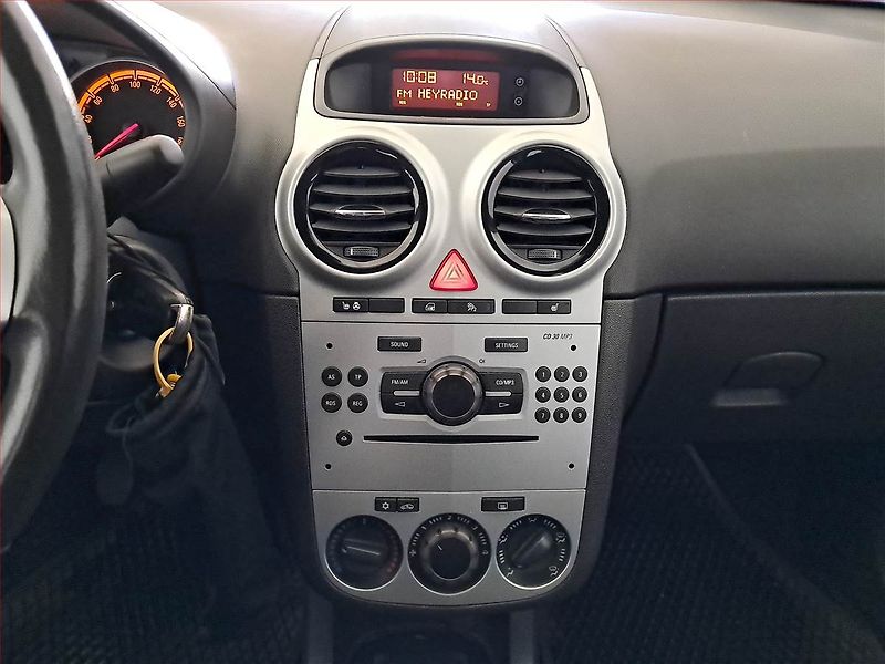 Opel Corsa (2009) 1.2, po STK, jezdí výborně - fotka 12 z 14