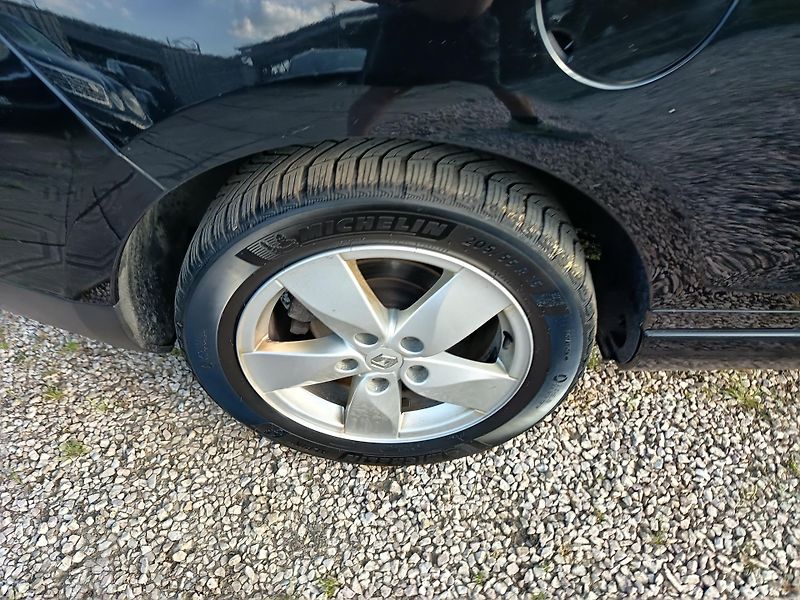 Renault Mégane (2011) Kabroušek 1.4 96kw - fotka 37 z 53