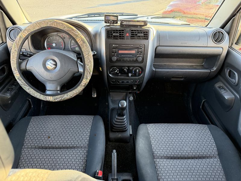 Suzuki Jimny 1,3i/63kW 4x4 - Klima,TZ,... - fotka 25 z 70