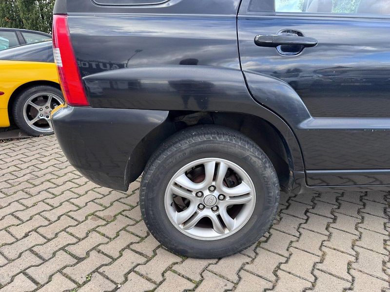 Kia Sportage (2004) 2,7i V6 129 KW AUTOMAT 4X4 - fotka 15 z 45