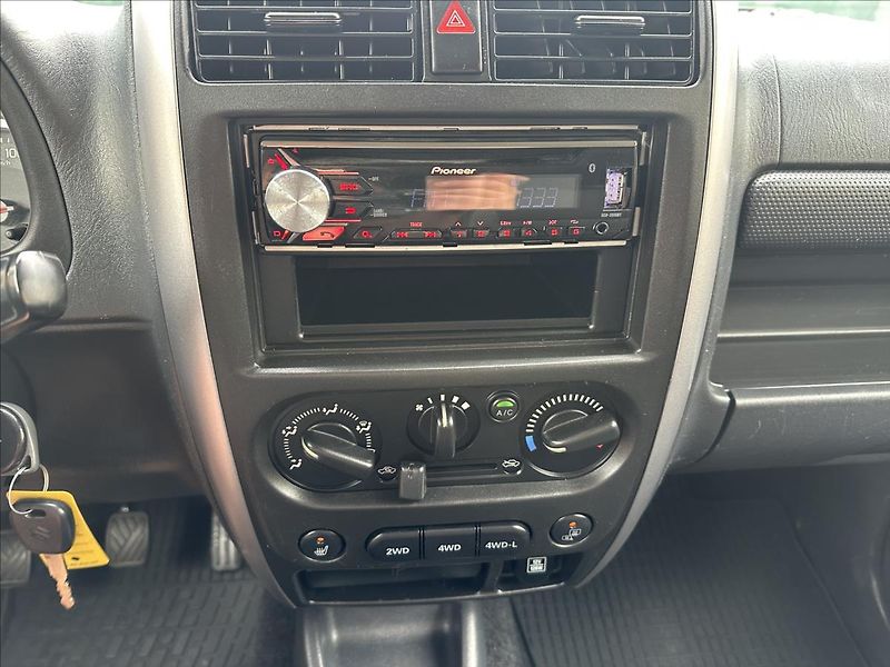 Suzuki Jimny 1,3 4x4 KLIMA BEZ KOROZE - fotka 17 z 21