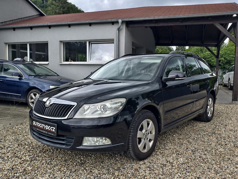 Škoda Octavia KOMBI 1.6 TDi 77kW VÝHŘEVY PDC - fotka 17 z 18