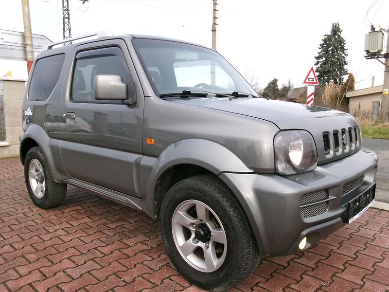 Suzuki Jimny (2006) 1,3i KLIMA ALU VÝHŘEV TAŽNÉ - fotka 11 z 34