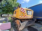 Caterpillar (2015) kolový bagr MH 3022 - náhled 1