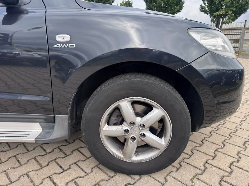 Hyundai Santa Fe (2007) 4X4 2,2CRDI 114KW 7 MÍST AUTOM - fotka 16 z 50