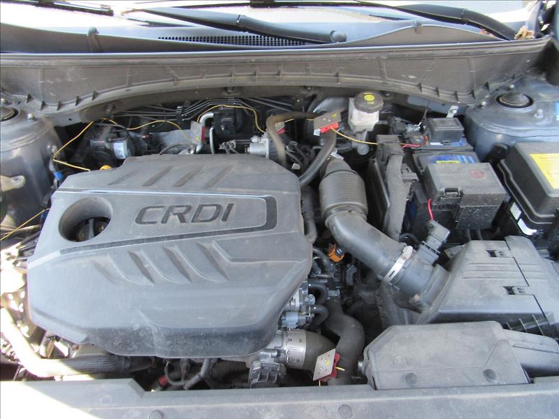 Hyundai Tucson 1,6 CRDi Style AWD AUT - fotka 33 z 35