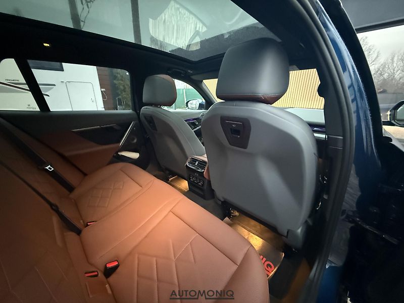 BMW Řada 5 (2025) 550e xDrive Touring M Sport - fotka 21 z 34