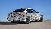 Prozatím maskované BMW M5.