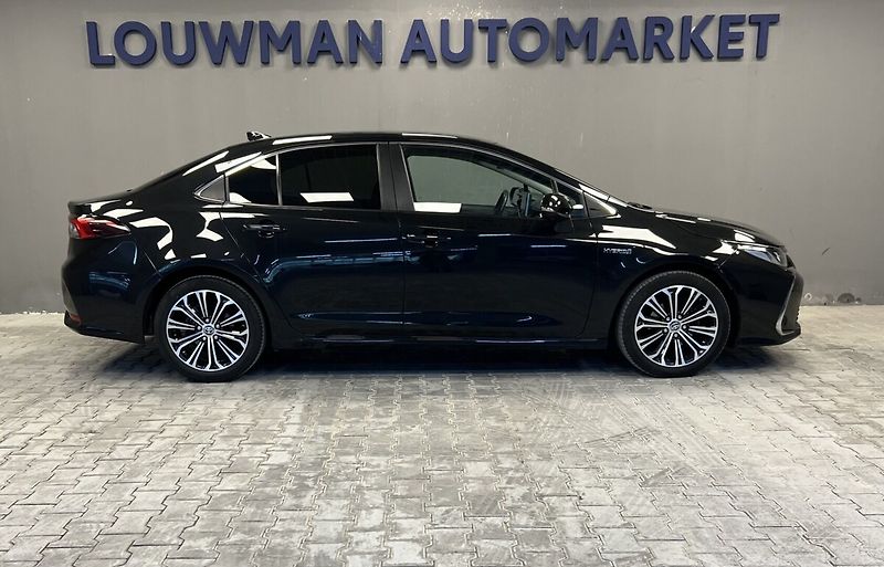 Toyota Corolla 1,8 Hybrid AT Comfort Style Te - fotka 16 z 16
