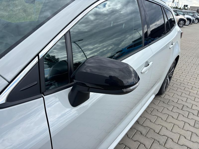 Toyota Corolla 1.8 HSD e-CVT Style Tech - fotka 27 z 28