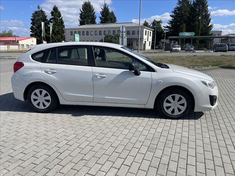 Subaru Impreza 1,6 i 84kw AWD Euro5 serviska - fotka 35 z 36