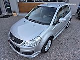 Suzuki SX4 (2013) 1.6VVT 88KW CITY + - náhled 51