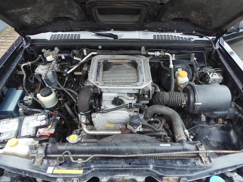 Nissan Navara (2004) 2.5 TD 4x4 dlouhá REZERVACE  - fotka 12 z 12