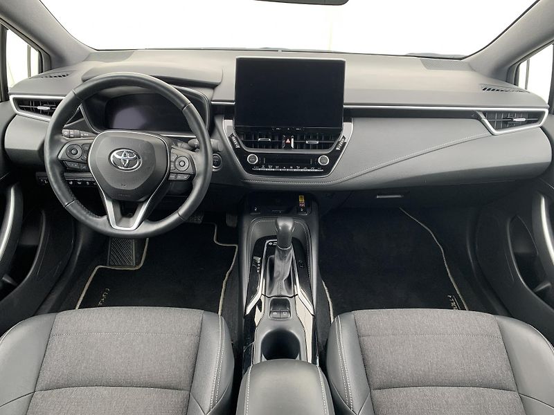 Toyota Corolla TS STYLE 1.8 HEV 103kW e-CVT - fotka 2 z 18