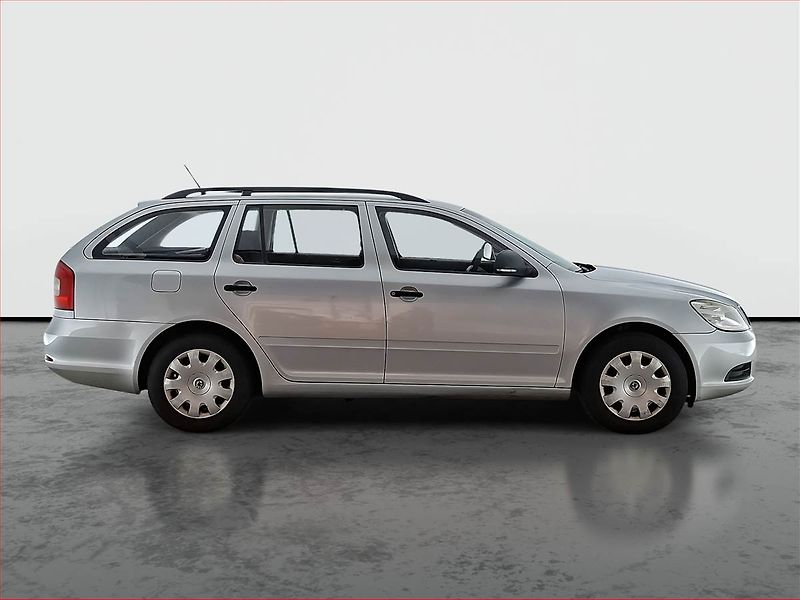 Škoda Octavia (2011) 1.6 TDI, slušný stav - fotka 6 z 13