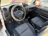Suzuki Jimny 1,3i/63kW 4x4 - Klima,TZ,... - náhled 13