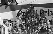 Pódium Velké ceny Holandska 1977. Zleva Jody Scheckter, Niki Lauda a Jacques Laffite.