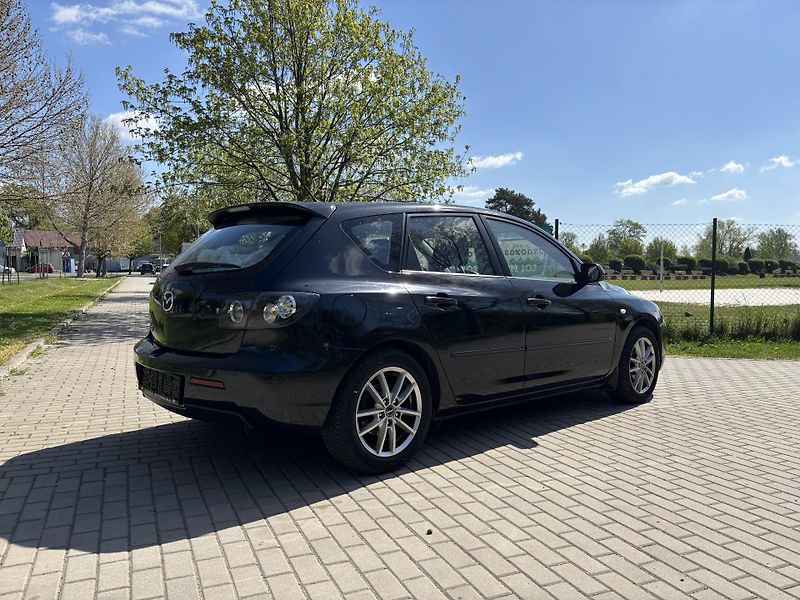 Mazda 3 1.6 Sport Active - fotka 9 z 26