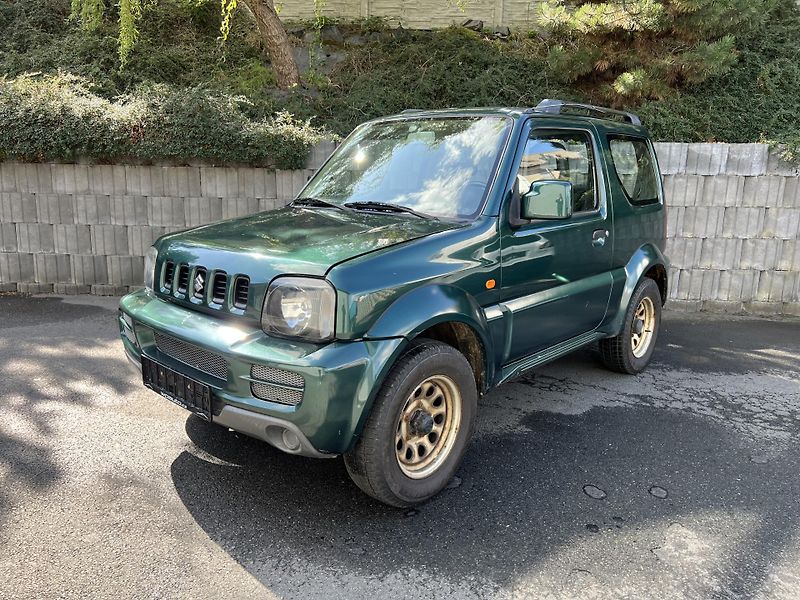 Suzuki Jimny 1.3 16v 63 kW 72.000KM 1.MAJ - fotka 2 z 14