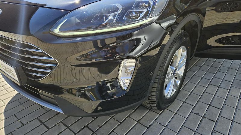 Ford Kuga (2023) 2.5i HEV 140 kW Titanium 4x4  - fotka 37 z 37